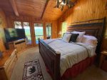 Open Loft Master Bedroom with a King Bed, a Private Screen Porch and a Smart TV Streaming Only 